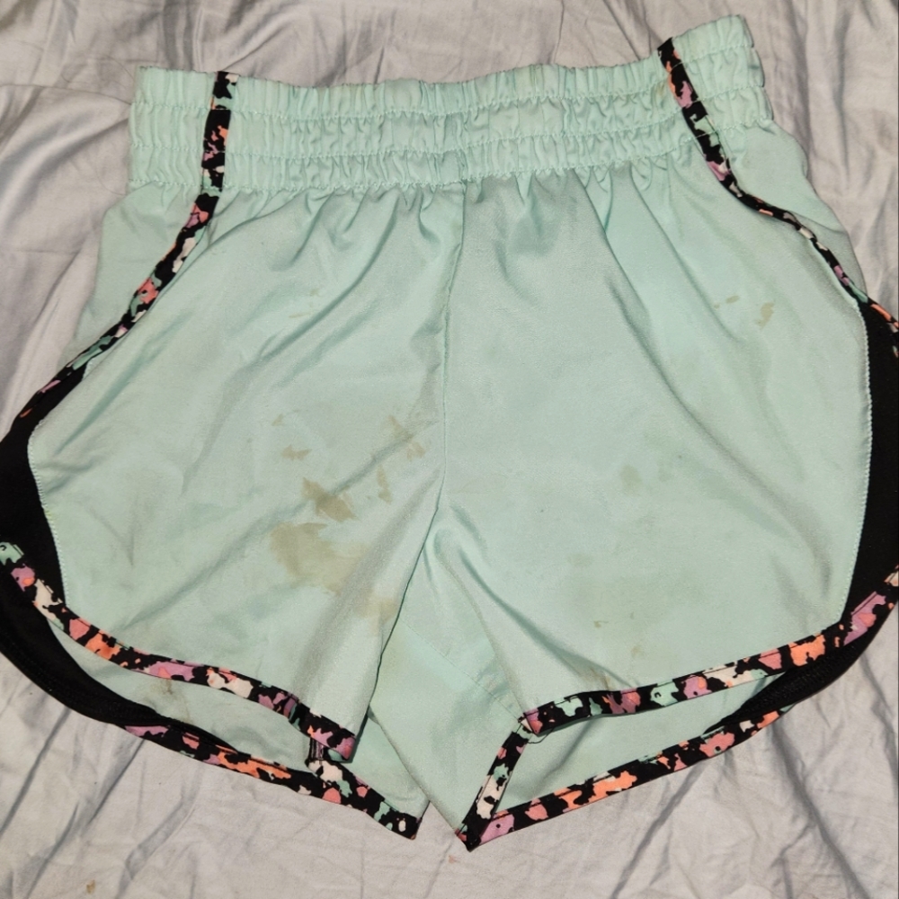 Little girls play shorts stained as pictured. Very comfy!